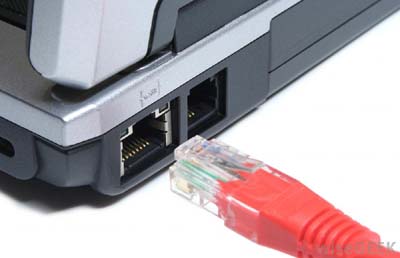 laptop ethernet port showing where a CAT 5 cable plugs in